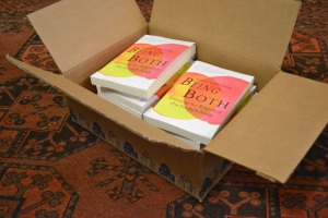 Opening the first box of paperbacks. Random House pattern echoed in my grandfather's Persian carpet.